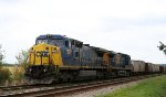 CSX 7395 leads a rock train